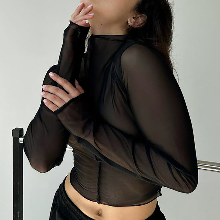 Dame Gennemsigtig Bluse med voluminøse ærmer og elegante knapdetaljer Stilla
