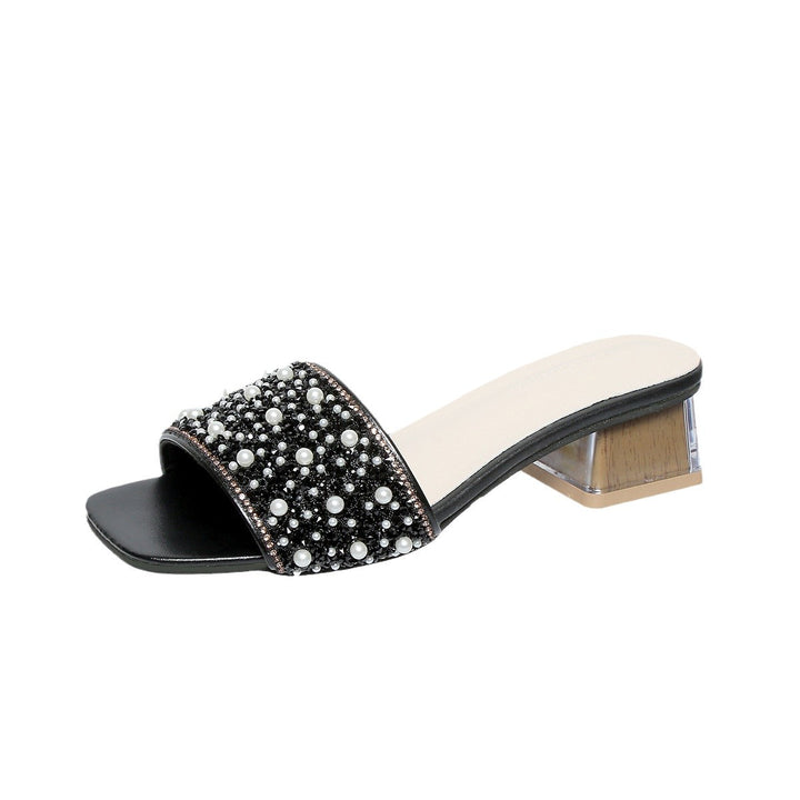 Dame mules med funklende perleaccent og elegant transparent blokhæl Stilla