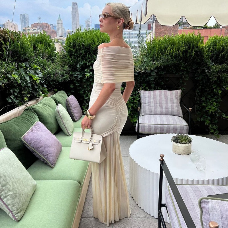 Dame Elegant Taillet Maxikjole med Off-Shoulder Design og Flæsedetaljer Stilla