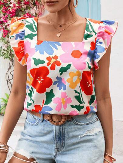 Damebluse med flæsekanter og blomstermotiver Stilla