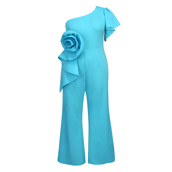 Dame jumpsuit med asymmetrisk snit og voluminøs blomsteraccent Skovae
