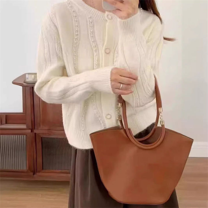 Dame cardigan med elegante perledetaljer og klassisk snit Stilla