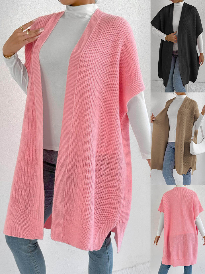 Dame strikjakke i afslappet oversized stil med åben front og sideslids Stilla