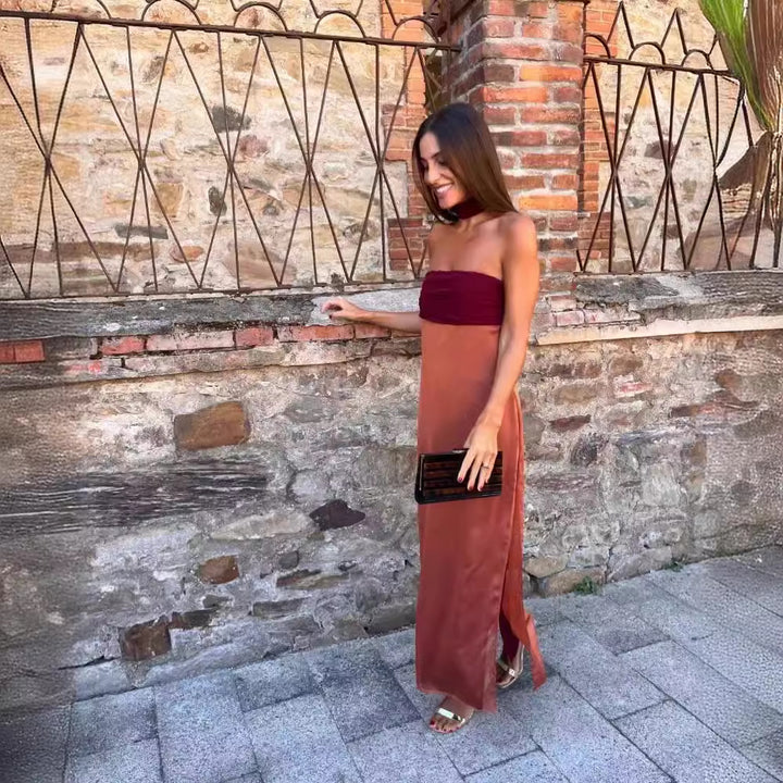 Dame Maxikjole med legende halterneck og elegant ruffle-detalje Stilla