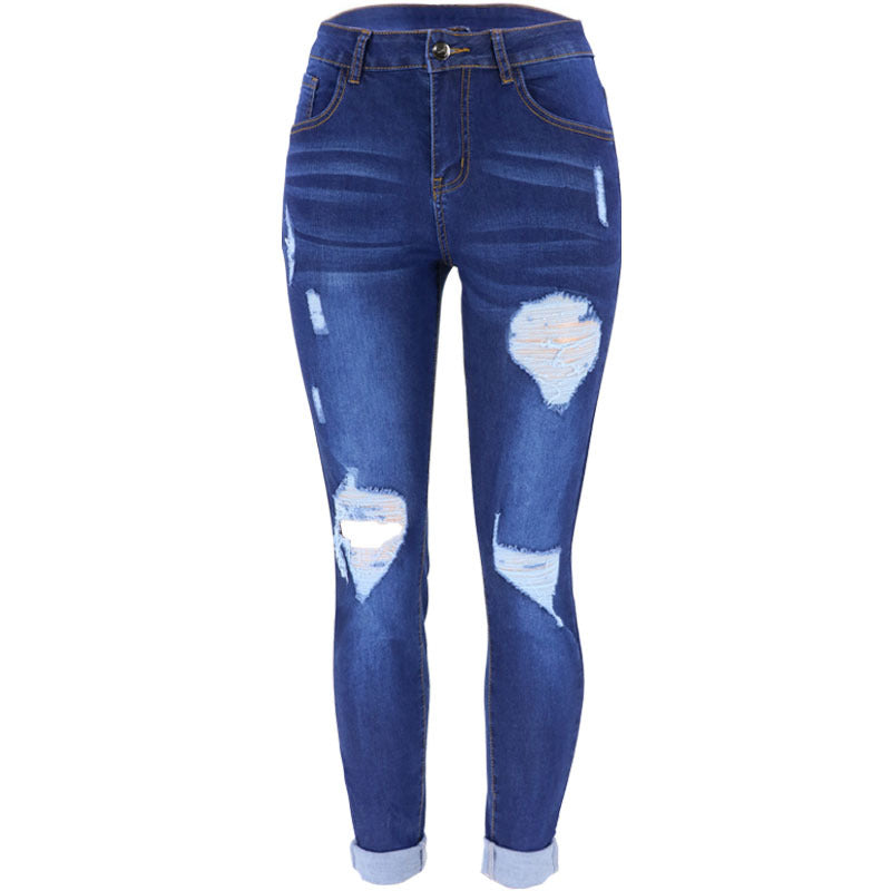 Dame figurtilpassede jeans med moderne destroyed-look og høj talje Stilla