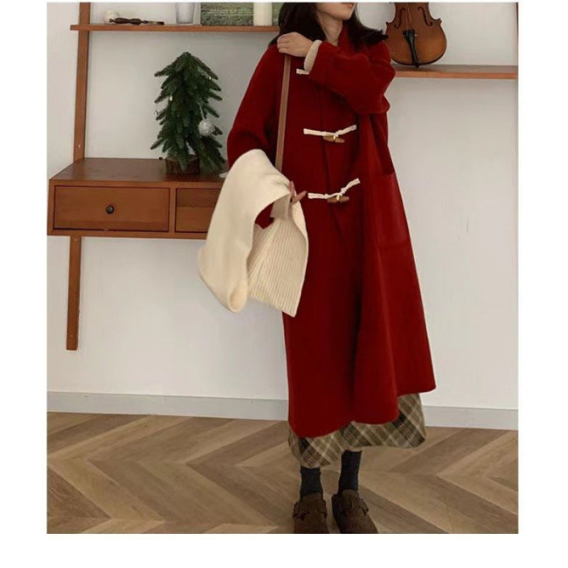 Kvinders Duffle Coat med praktiske lommer og dekorative træ toggles.