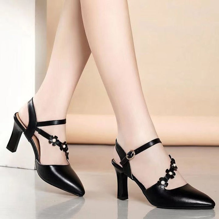 Dame Slingback-pumper med florale accenter og elegant spænde Stilla