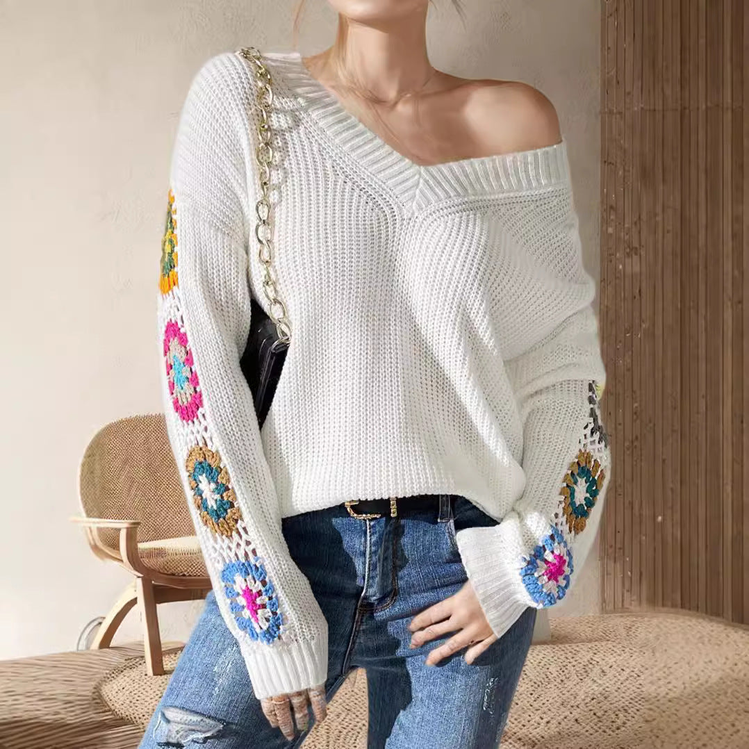 Dame mode strikket sweater med unik skæring og kreative hæklede motiver Stilla