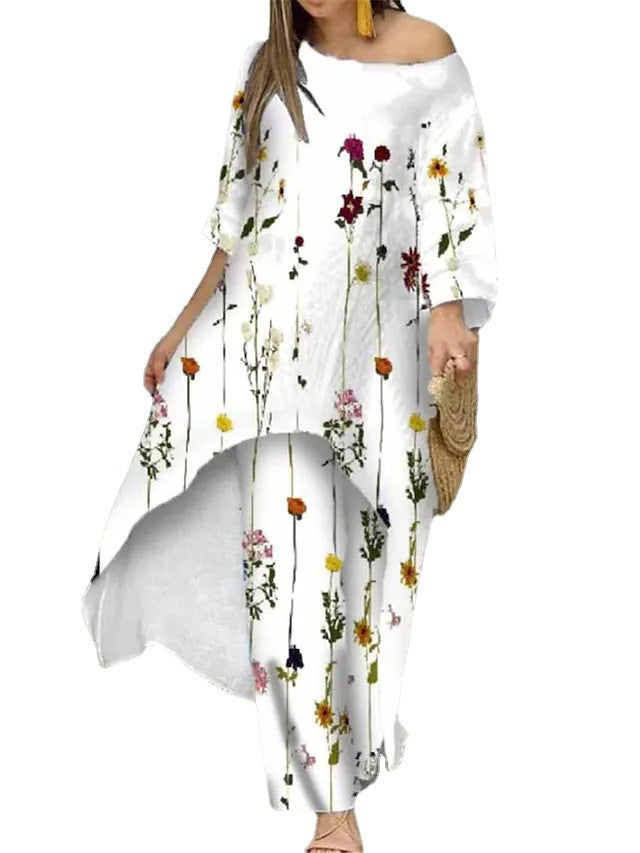 Dame maxikjole med blomsterdesign og asymmetrisk kant Stilla