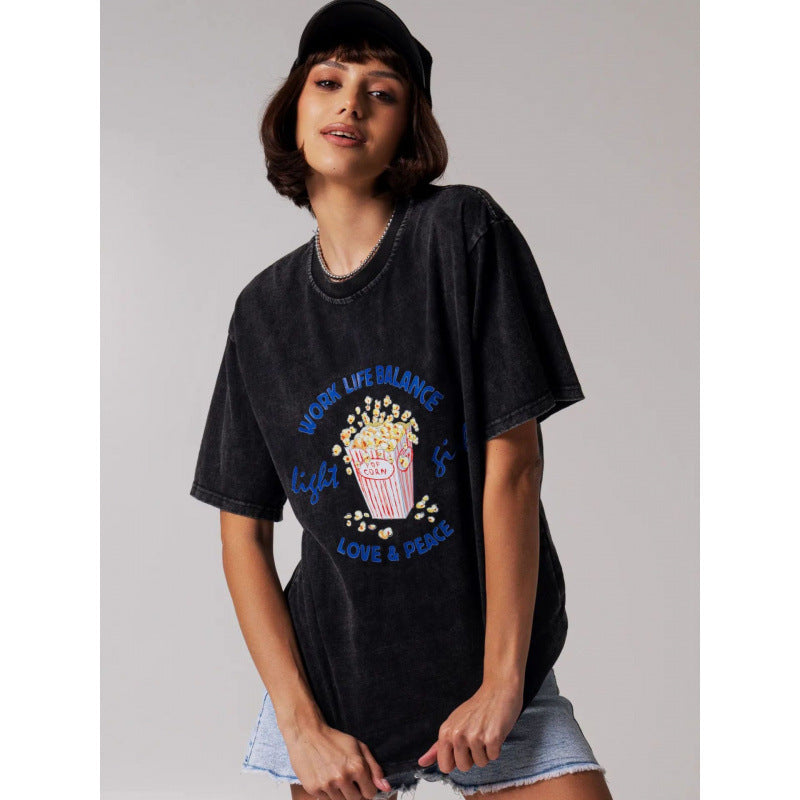 Dame T-shirt med grafisk popcorn-motiv og afslappet pasform Stilla