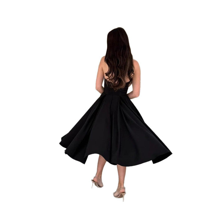 Dame aftenkjole med svingende nederdel og strapless design Stilla