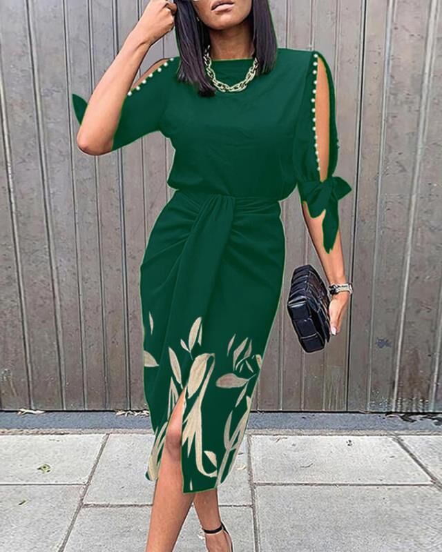 Elegant midi-kjole til kvinder med stilfulde cut-out-ærmer Stilla