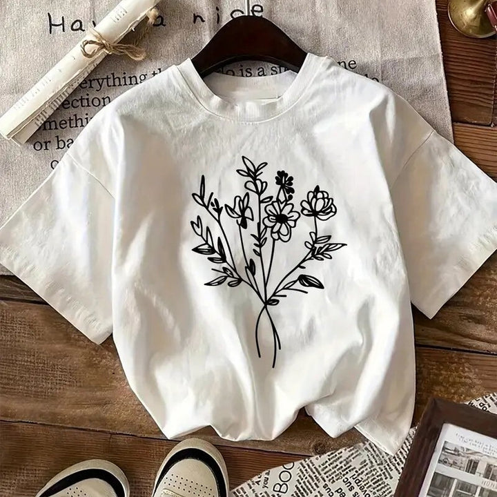 Dame T-shirt med kreativt blomstertryk og afslappet pasform Stilla