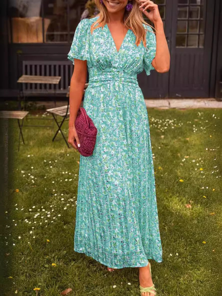 Dame maxikjole med elegant blomsterdesign og dyb V-udskæring Stilla