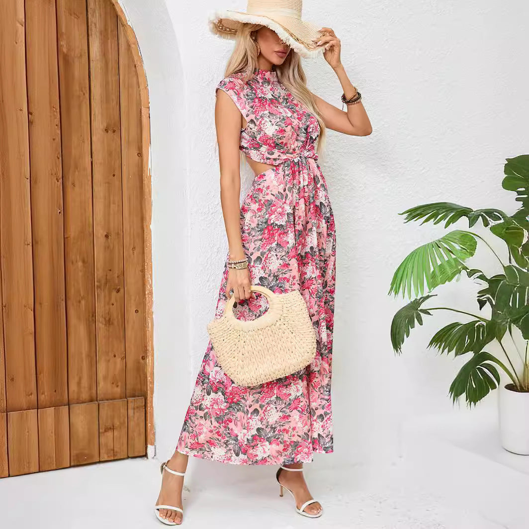 Dame maxikjole med floralt omslagsdesign og asymmetrisk kant Stilla