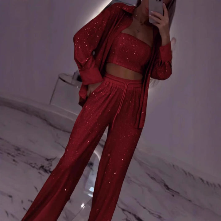 Dame fritids-loungewear sæt med glitrende top og elastiske bukser Stilla