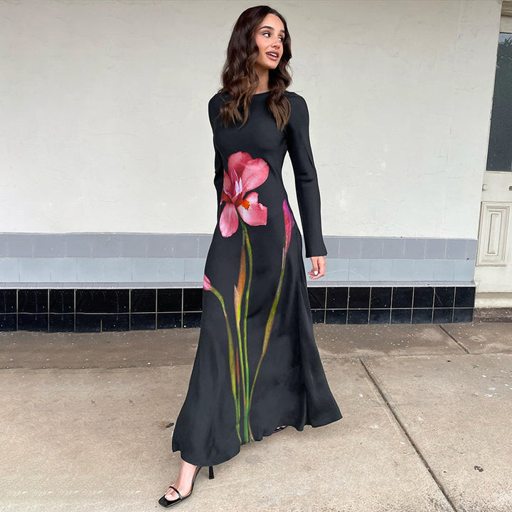 Dame maxikjole med blomstertryk og elegant langt ærme Stilla