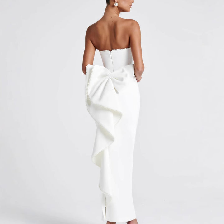 Kvinders elegante figursyede maxikjole med off-the-shoulder design og trendy ruffle detaljer