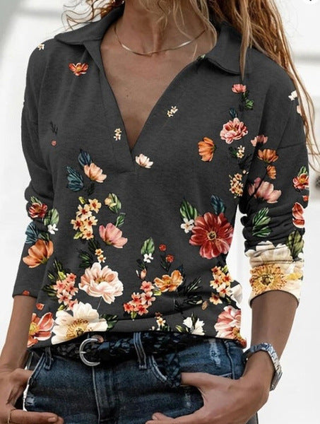 Damebluse med blomsterdesign og polo-krave Stilla