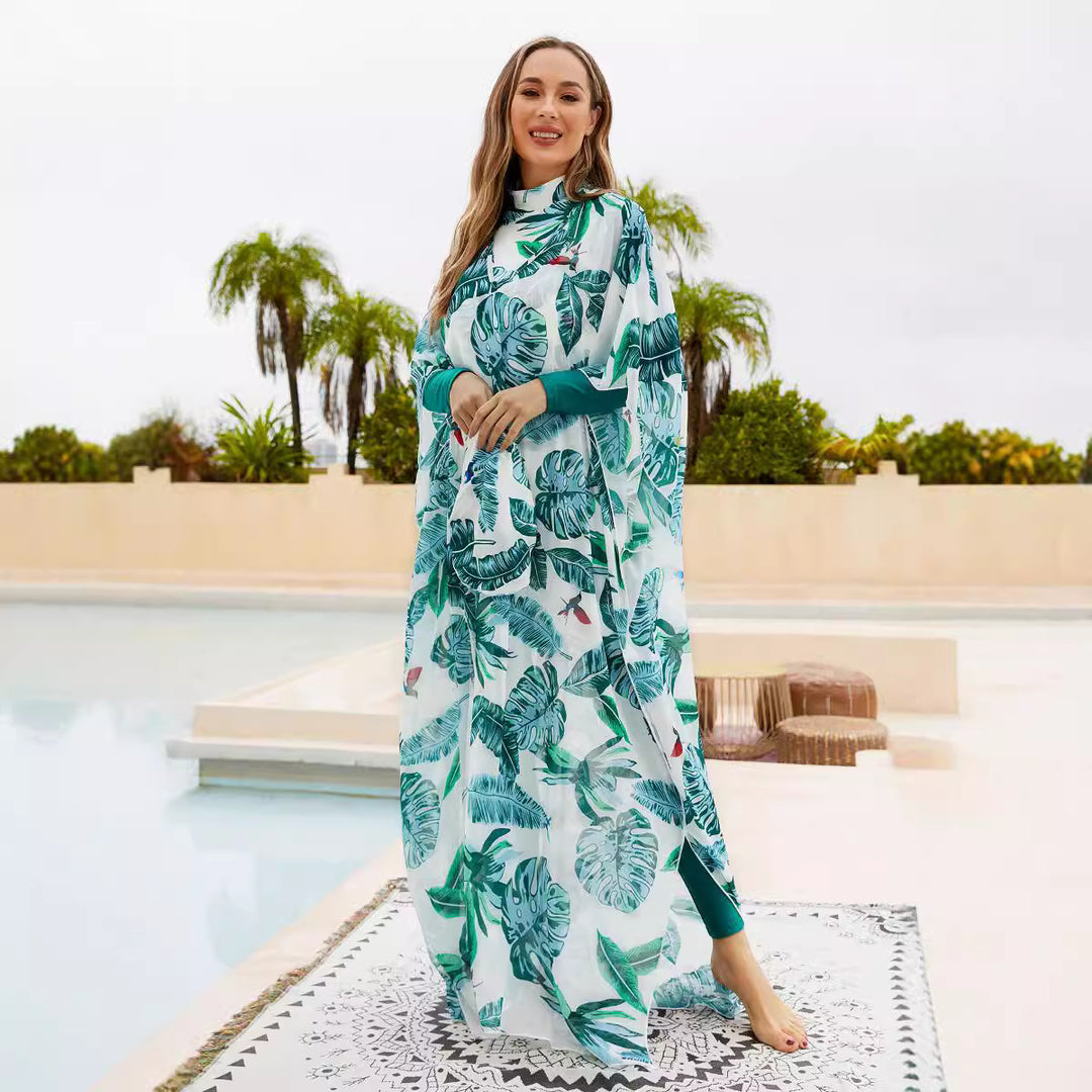 Dame Strandponcho med blomsterdesign og lange ærmer Stilla