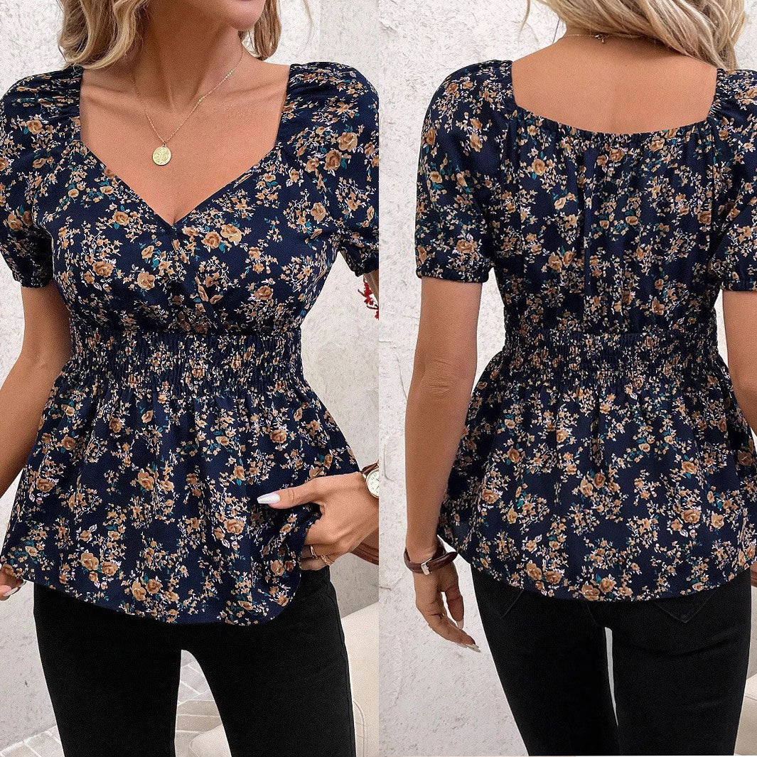 Damebluse med blomsterdesign og elastisk liv Stilla