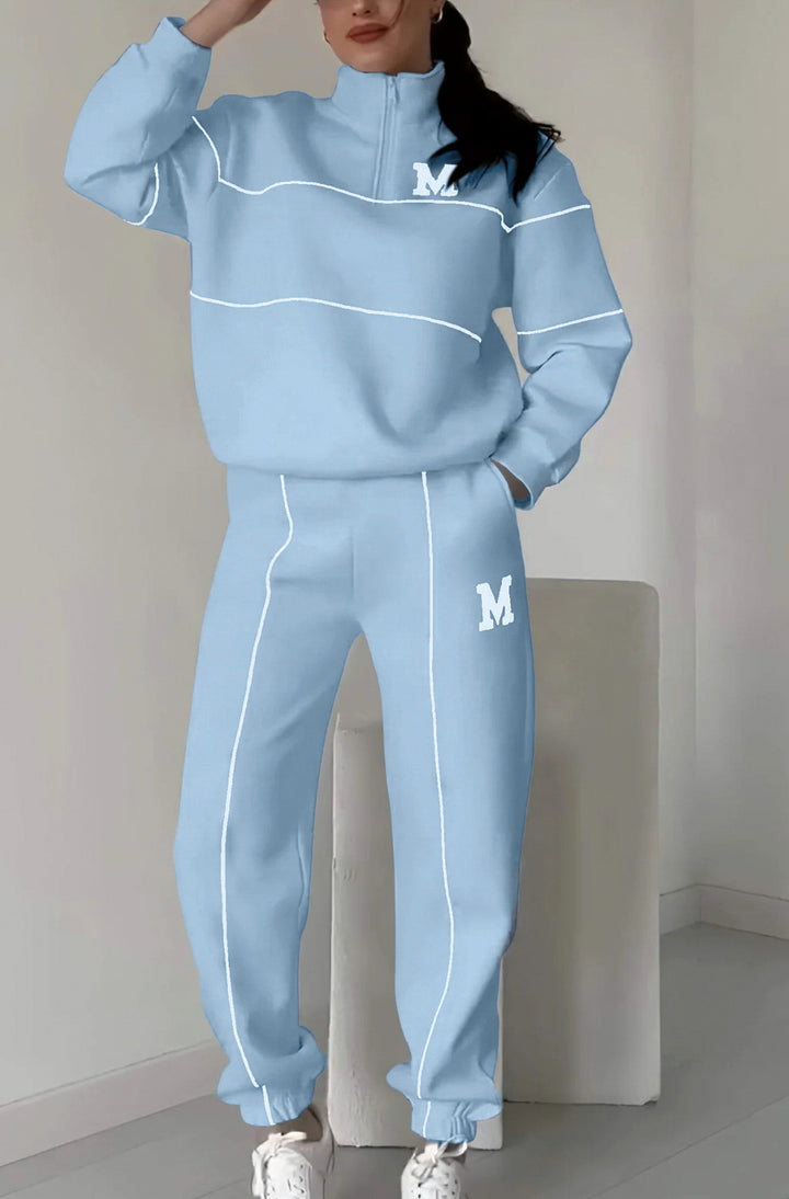 Kvinders sporty loungewear-sæt med halv lynlås og elastisk talje Stilla