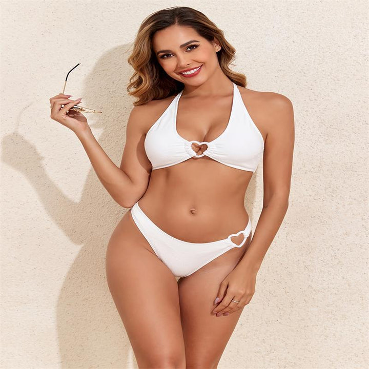 Dame triangel-bikini med dekorativt hjerte-detalje og smart ribstruktur Skovae