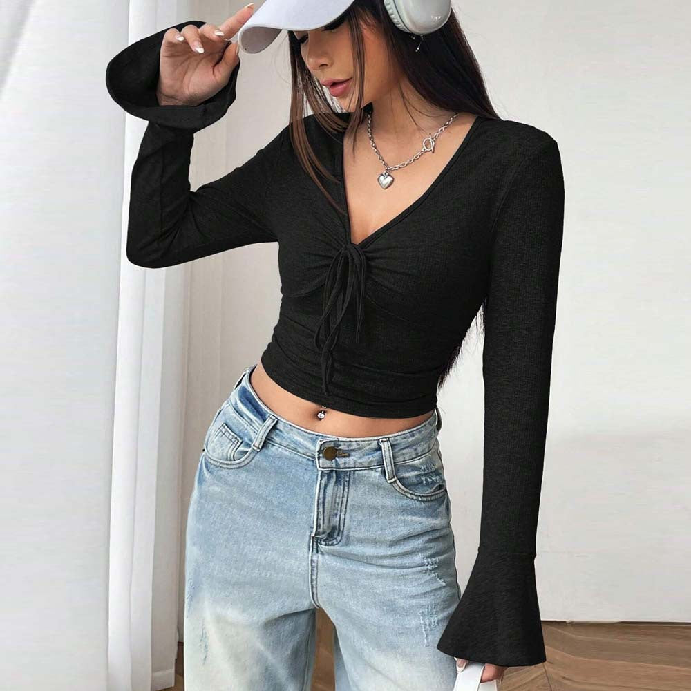 Kvinders langærmet crop top med raffineret knudedesign Stilla