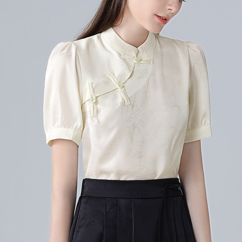 Damebluse med elegant ståkrave og kunstneriske knapdetaljer Stilla