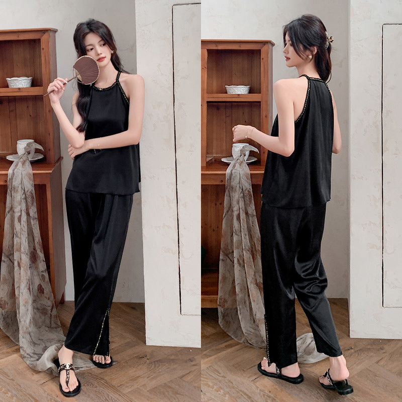 Dame Satin Pyjama-sæt med elegante spidse detaljer og løs pasform Stilla