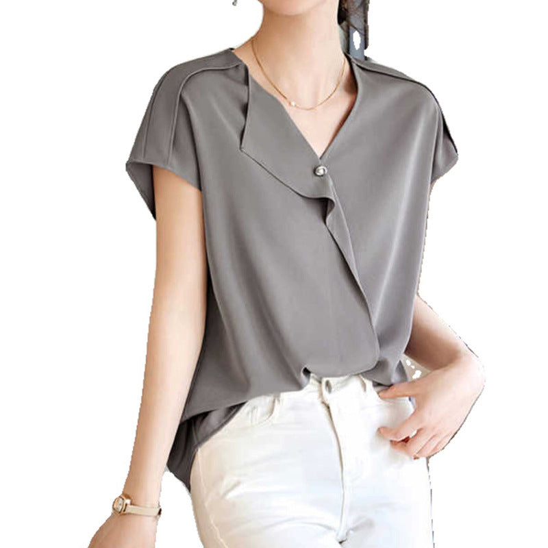 Damebluse med elegant viklook Stilla
