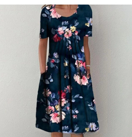 Dame fritidskjole med blomstret design og praktiske lommer Stiila