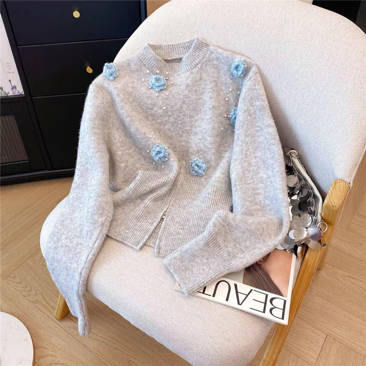 Dame sweater med tekstureret blomsterdesign og perle udsmykning Stilla