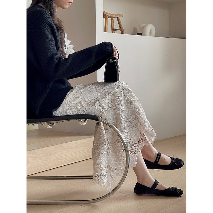 Dame spids maxiskørt med elegant blomsterdesign og transparente detaljer Stilla
