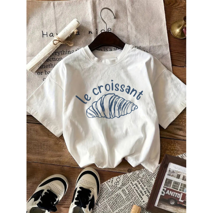 Dame T-shirt med kreativt croissant-motiv og afslappet oversized-snit Stilla