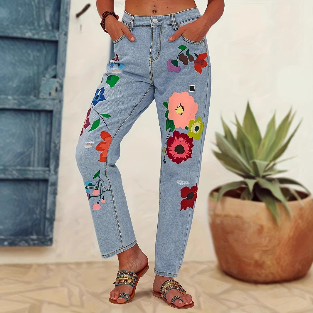 Damejeans med blomstret design og fashionable revnedetaljer Stilla