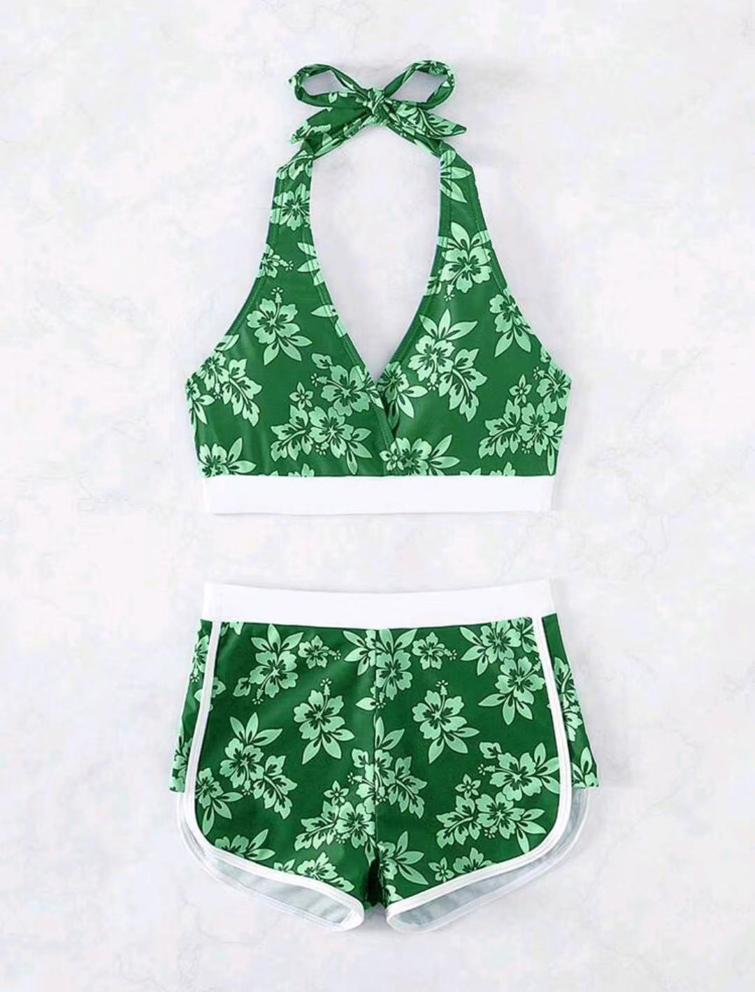 Dame bikini-sæt med blomsterdesign og fashionabel farvekontrast Stilla