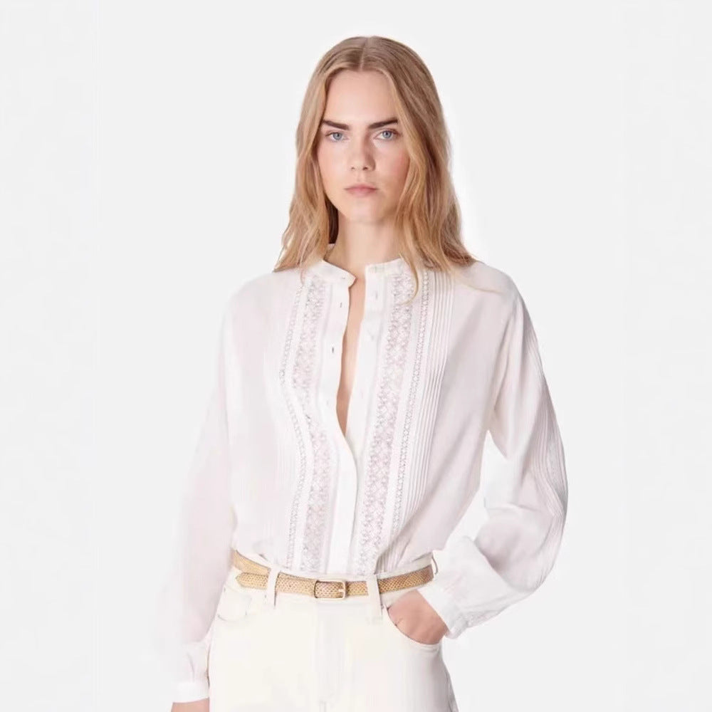Damebluse med fine broderier og dekorative knapdetaljer Stilla