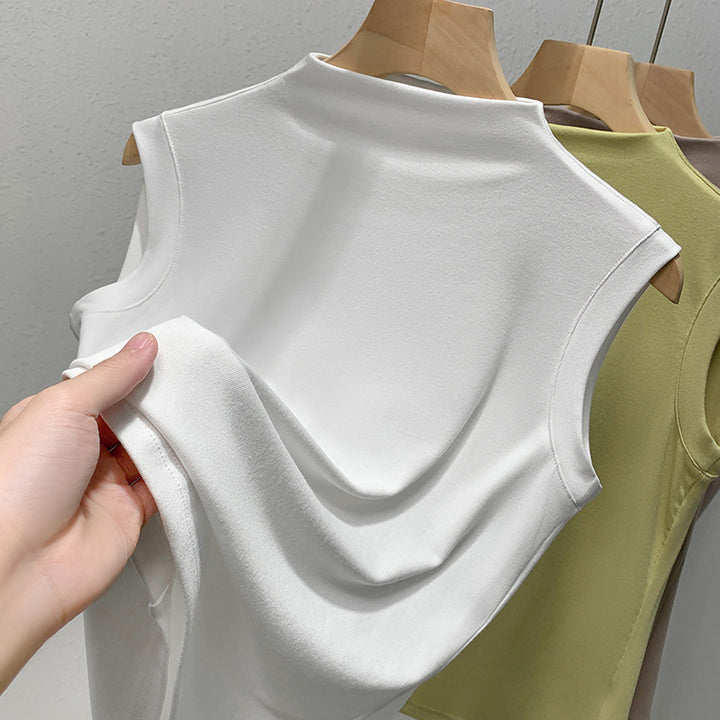 Dame ærmeløst top med elegant høj krave og flydende materiale Stilla