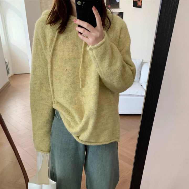 Kvinders hyggelige hætte sweatshirt lavet af blødt fleece-materiale med kengurulomme Stilla