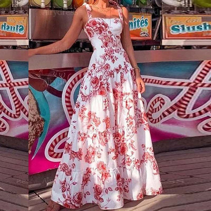 Dame Maxikjole med romantisk blomsterprint og svajende skirt Stilla