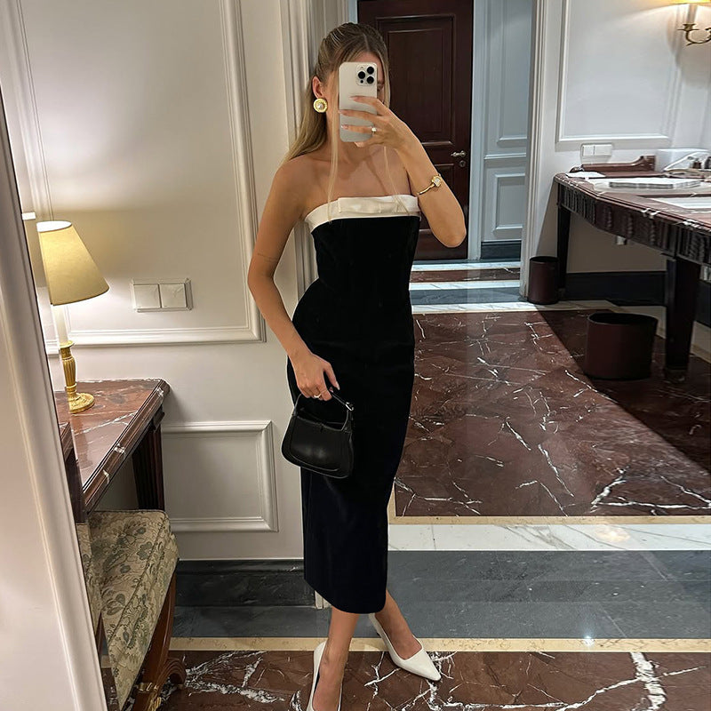Dame cocktailkjole med off-shoulder design og elegant farveaccent Skovae