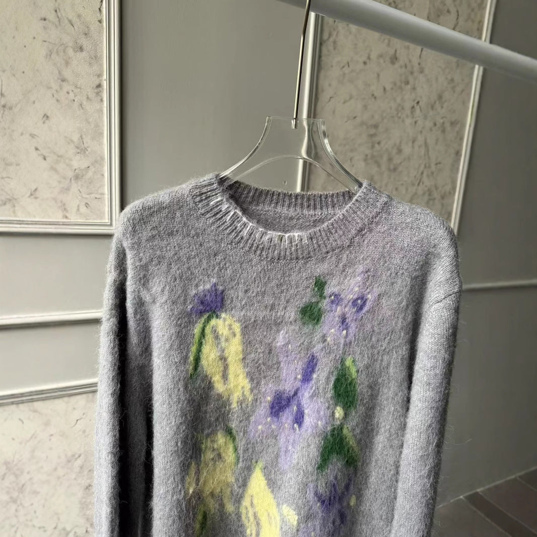 Dame strikpullover med blomsterdesign og blød tekstur Stilla