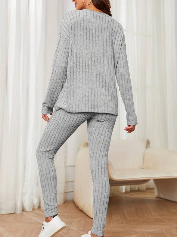 Dame hyggelig strikdragt med elegante striber Stilla