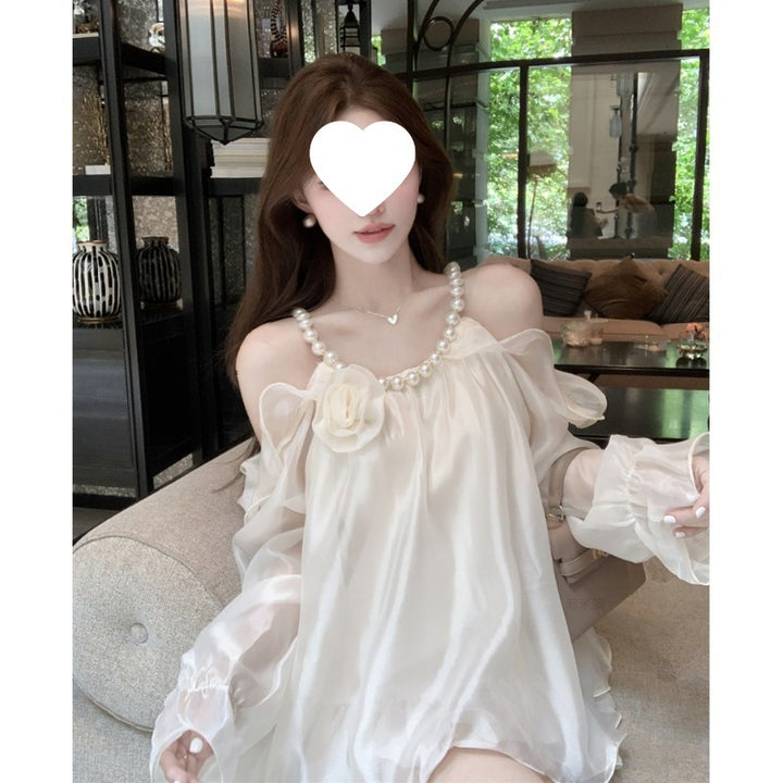 Dame Elegant Off-Shoulder Bluse med Rufflesleeves og floral accent Stilla