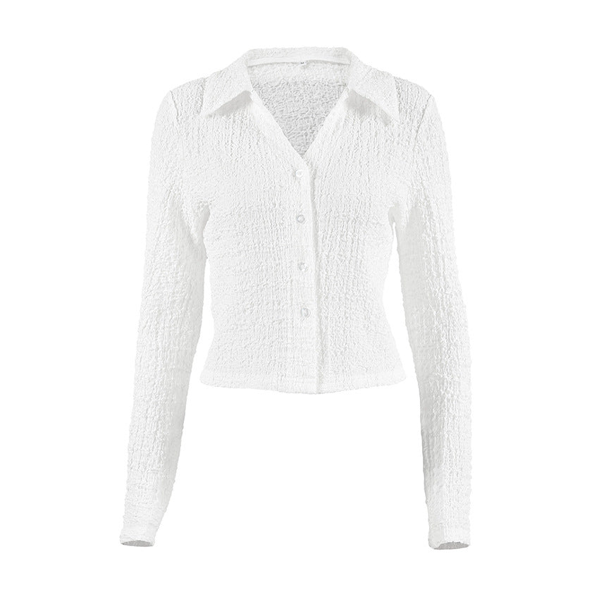 Dame langærmet bluse med struktureret materiale og elegant knapliste Stilla