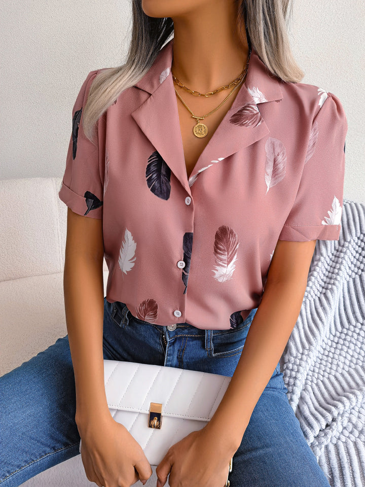 Damebluse med elegant fjerdesign Stilla
