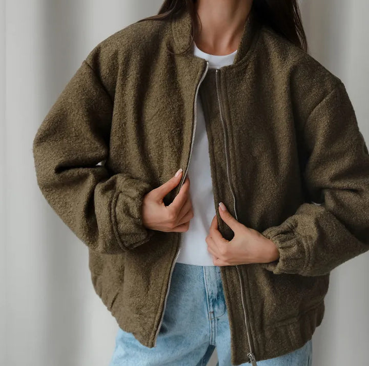 Dame overgangsjakke i varmt teddy-fleece med praktiske lommer og elastiske manchetter Stilla