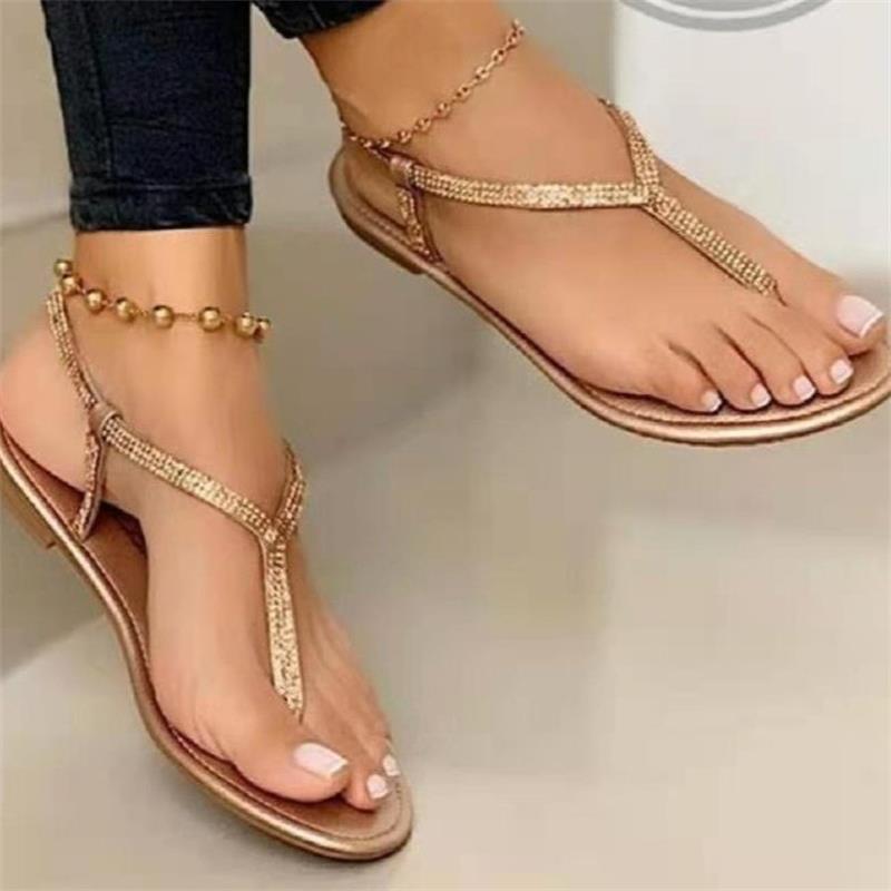 Dame elegante Tåsplit-sandaler med glitrende strass-applikationer Stilla