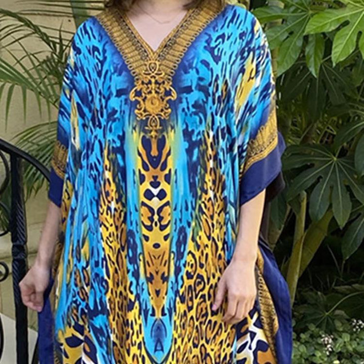 Dame Kaftan i elegant dyremotiv med dyb V-udskæring og flydende snit Stilla